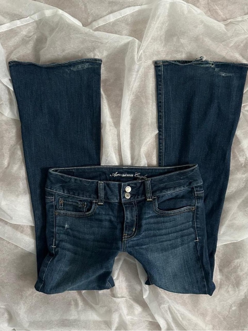 Y2K low rise dark washed jeans with double button detailing